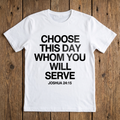 White t-shirt with black text on a wooden surface